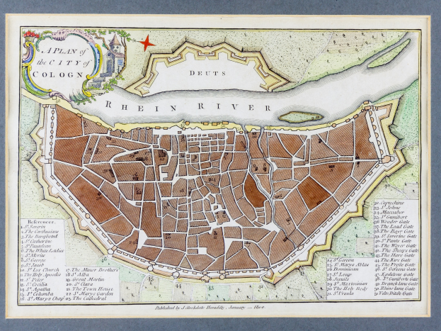 Ein gerahmtes Bild einer Karte von Köln, Deutschland, mit dem Rhein im Hintergrund.