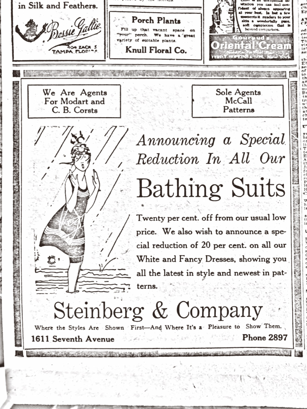 Eine Frau in einem weißen hochgeschlossenen Kleid mit langen Ärmeln und einem Dutt, umgeben von Text in einer Anzeige für Steinberg & Company's Badesachen.