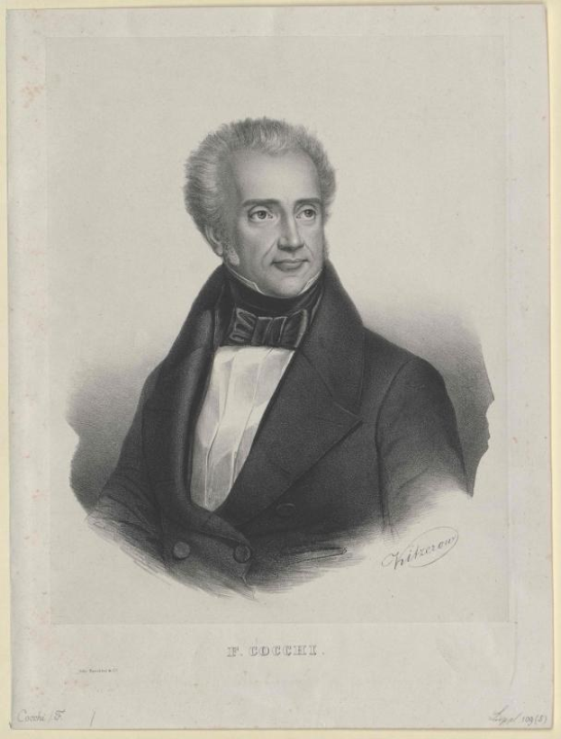 Schwarzes und weißes Porträt des Komponisten F. Cocchi in einem Smoking, mit der Bezeichnung "Die Musik der Oper" unten.