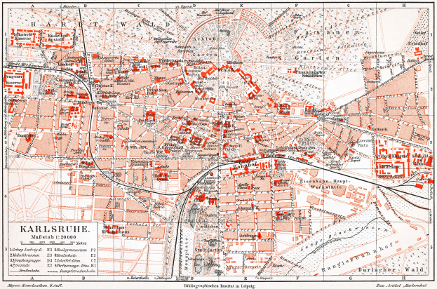 Ein detaillierter Stadtplan von Karlsruhe, Deutschland aus dem Jahr 1900 mit Text und umfassender Stadtübersicht.