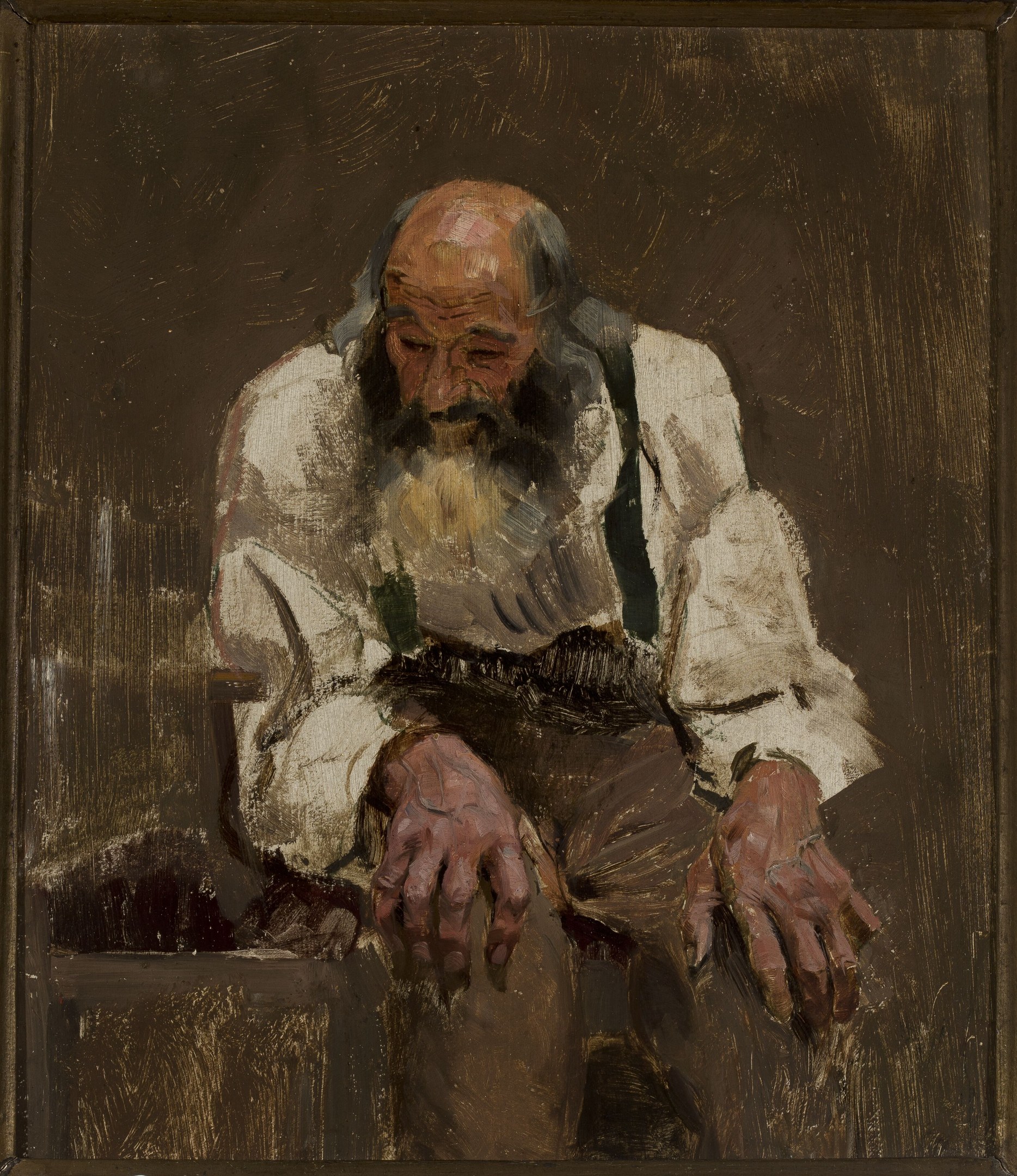 Ein gerahmtes Foto eines älteren Mannes mit Bart, der ein weißes Hemd und dunkle Hosen trägt und in einem Stuhl sitzt, die Augen geschlossen und die Hände auf den Armlehnen, mit einem friedlichen Gesichtsausdruck.