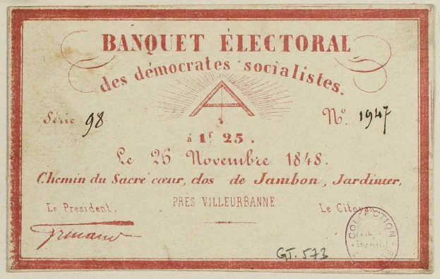 Alter Umschlag mit roter Einfassung und einer Briefmarke, beschriftet mit "Banquet Electoral des Democrats Socialists".